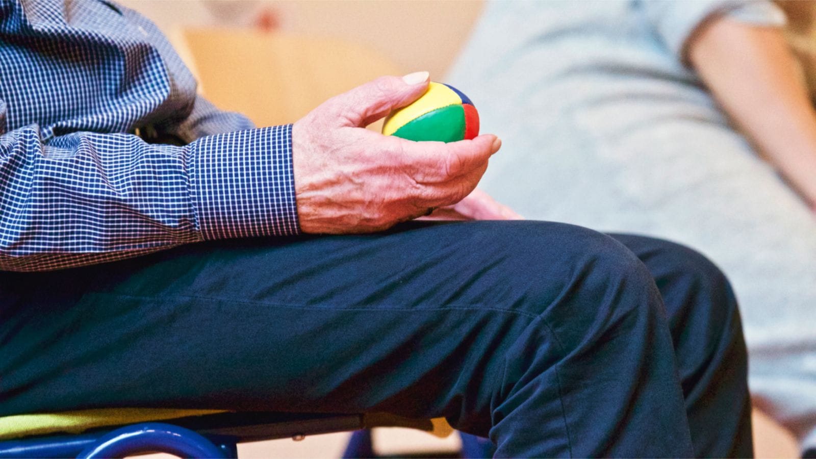 Medicare Rehab Coverage: Understanding the 3-Day Inpatient Rule 1 Hands holding a small multicolored therapy ball